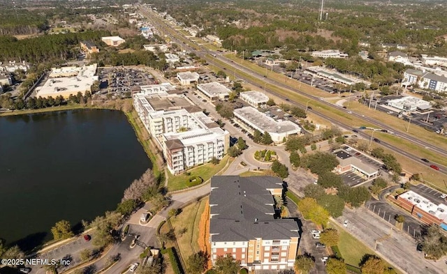 drone / aerial view with a water view