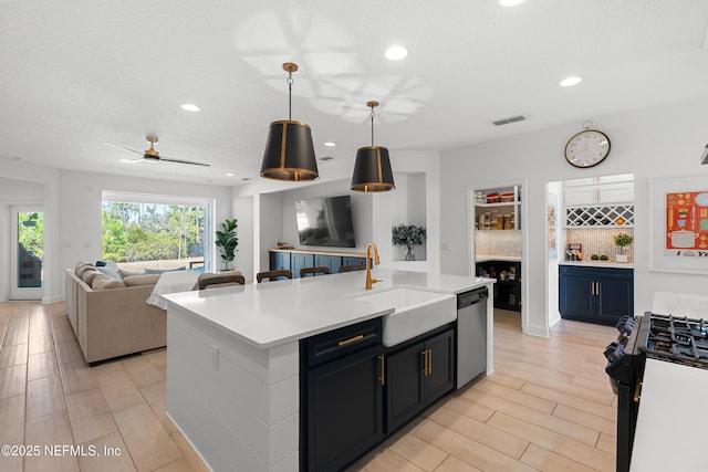 230 Marquesa Cir, Saint Johns, FL 32259 - kitchen with visible vents, open floor plan, a sink, stainless steel dishwasher, and gas stove
