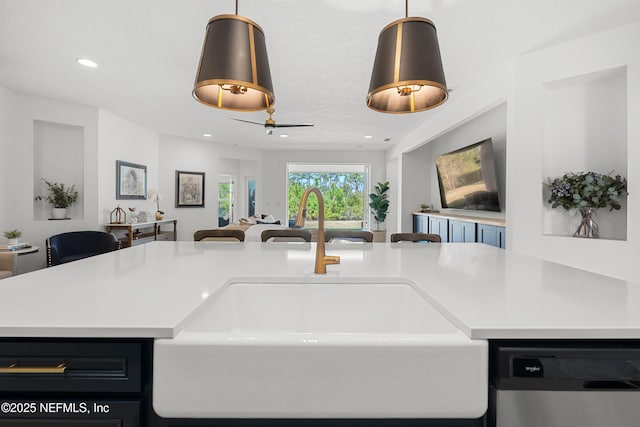 230 Marquesa Cir, Saint Johns, FL 32259 - kitchen with a sink, open floor plan, dishwasher, and light countertops