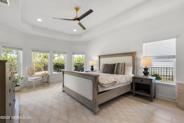 230 Marquesa Cir, Saint Johns, FL 32259 - bedroom with multiple windows, baseboards, and a raised ceiling