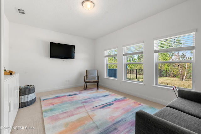 230 Marquesa Cir, Saint Johns, FL 32259 - living area featuring a healthy amount of sunlight, carpet, and visible vents
