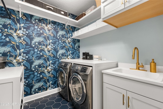 230 Marquesa Cir, Saint Johns, FL 32259 - clothes washing area featuring a textured ceiling, separate washer and dryer, a sink, baseboards, and cabinet space