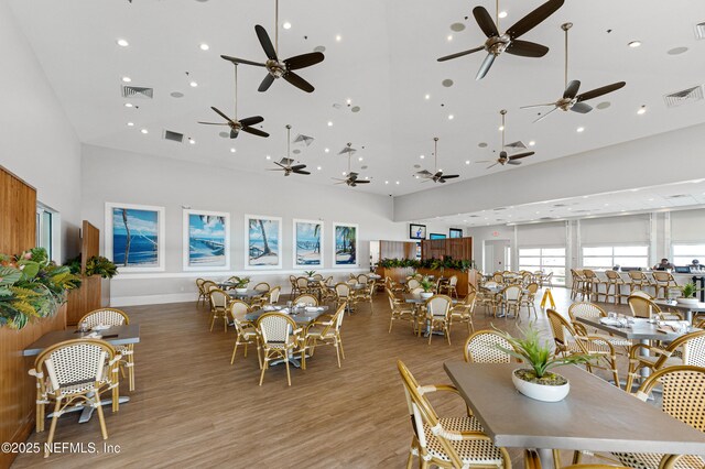 230 Marquesa Cir, Saint Johns, FL 32259 - dining space featuring a high ceiling, visible vents, and light wood-style floors