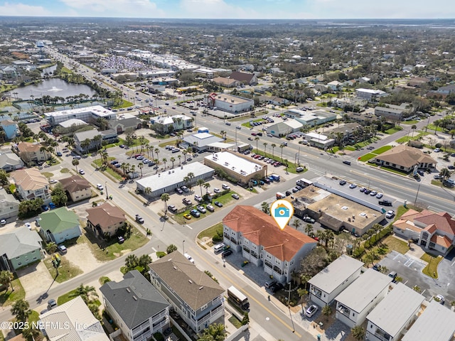 bird's eye view featuring a residential view and a water view