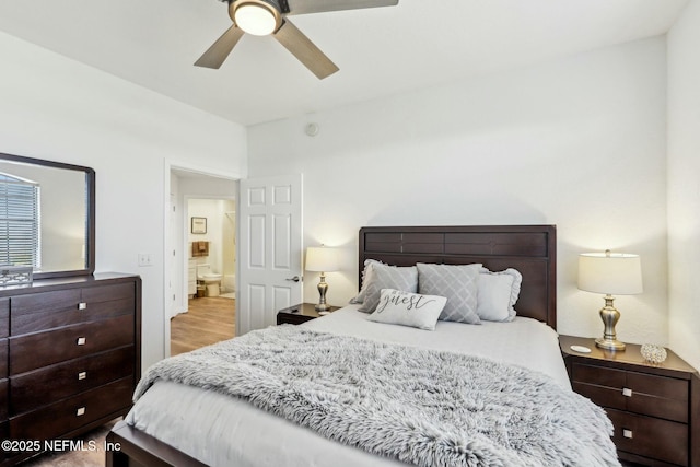 bedroom with ceiling fan and wood finished floors