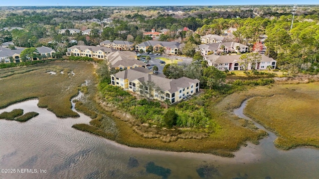 aerial view featuring a water view and a residential view