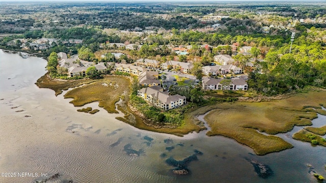 bird's eye view with a water view and a residential view