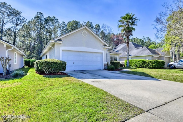 ranch-style house featuring a front yard, driveway, an attached garage, and stucco siding