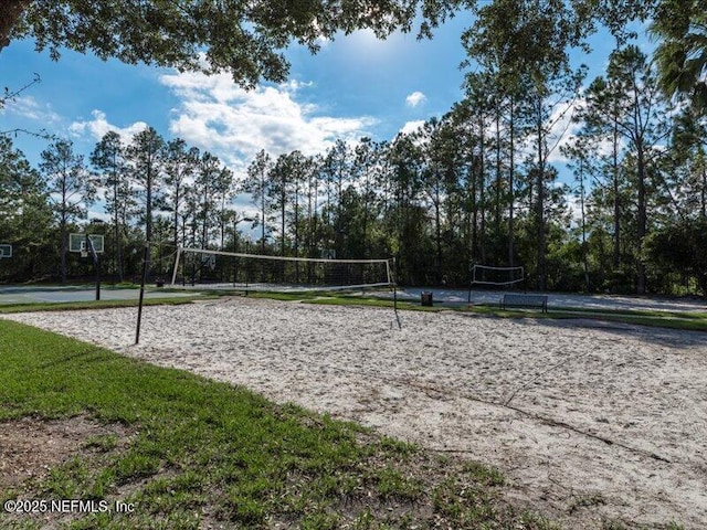 view of property's community featuring volleyball court