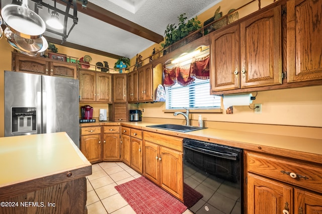 kitchen featuring brown cabinetry, dishwasher, stainless steel fridge with ice dispenser, light countertops, and a sink