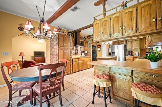 kitchen featuring visible vents, custom exhaust hood, light countertops, stainless steel refrigerator with ice dispenser, and beam ceiling