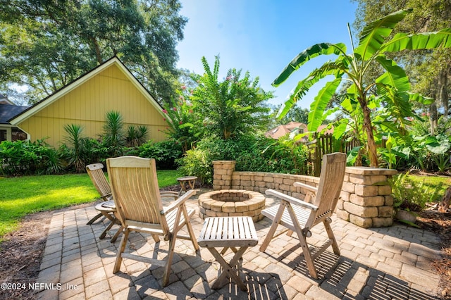 view of patio / terrace featuring a fire pit