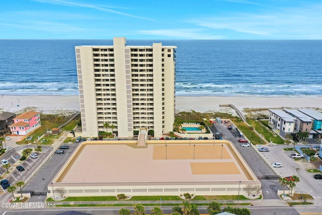 aerial view featuring a water view and a view of the beach