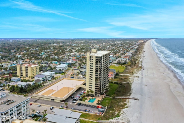 aerial view with a water view, a view of city, and a view of the beach