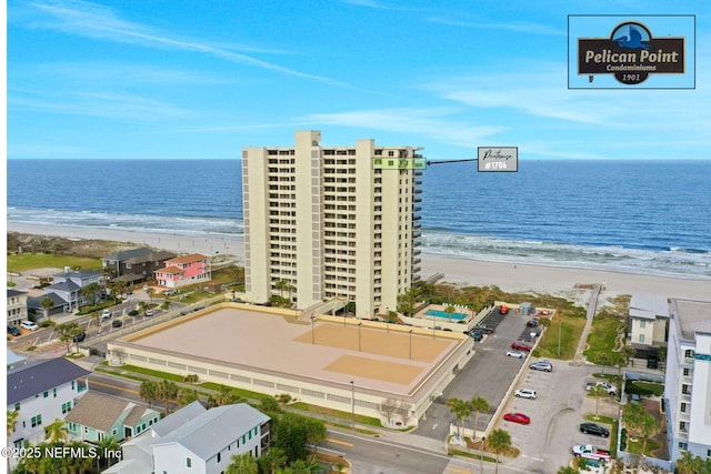 aerial view with a beach view and a water view