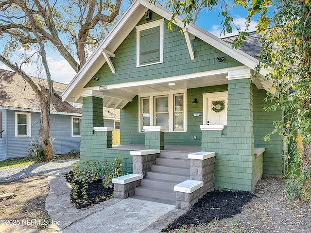 craftsman-style house featuring covered porch