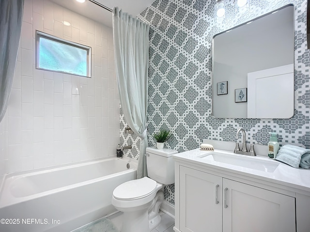 full bathroom featuring toilet, shower / tub combo with curtain, and vanity