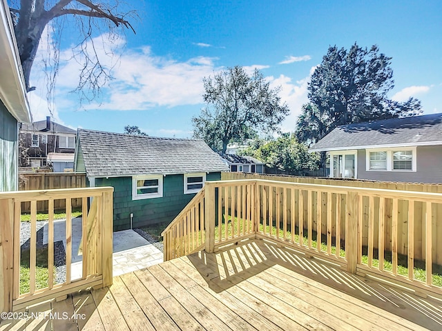 wooden deck featuring fence