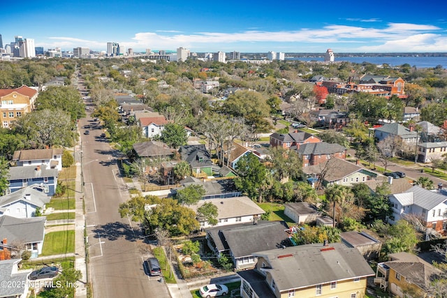 aerial view with a water view and a residential view