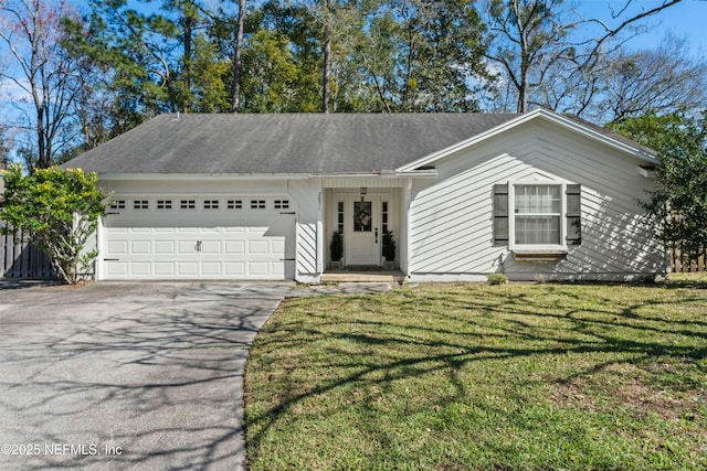 single story home with a garage, aphalt driveway, and a front yard