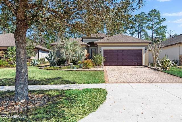 view of front of home with a garage, roof with shingles, decorative driveway, a front lawn, and stucco siding