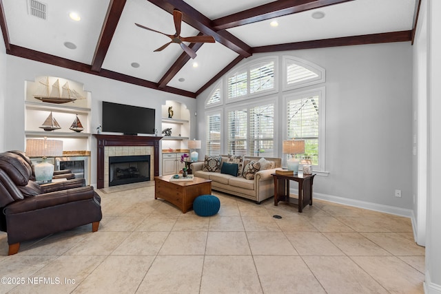 living area featuring built in features, light tile patterned floors, visible vents, lofted ceiling with beams, and ceiling fan