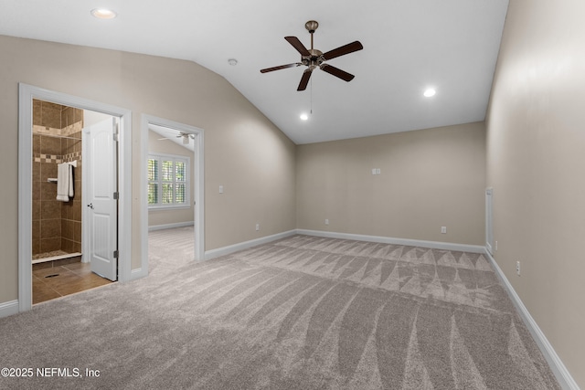 interior space featuring recessed lighting, baseboards, carpet floors, and vaulted ceiling