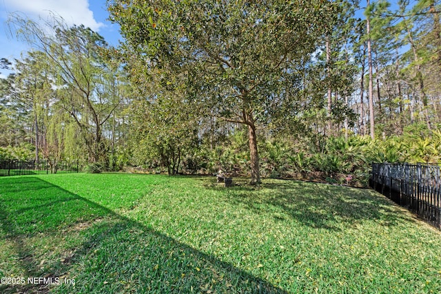 view of yard with fence