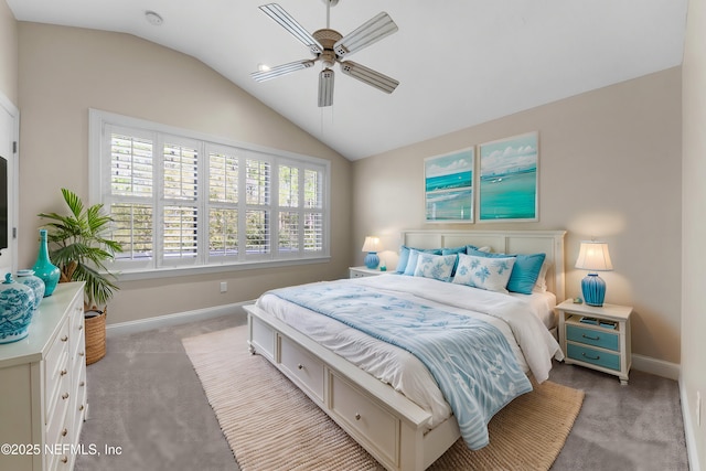 bedroom featuring baseboards, a ceiling fan, vaulted ceiling, and light carpet