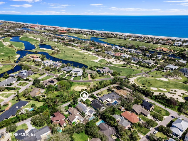 bird's eye view with a residential view, golf course view, and a water view