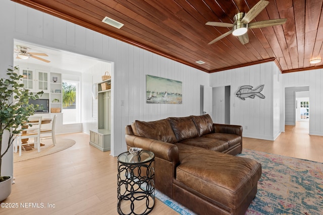 living room with visible vents, light wood-style flooring, ornamental molding, ceiling fan, and wood ceiling