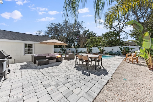 view of patio / terrace featuring an outdoor living space, outdoor dining area, and a fenced backyard