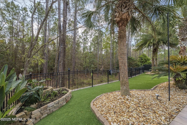 view of yard with fence