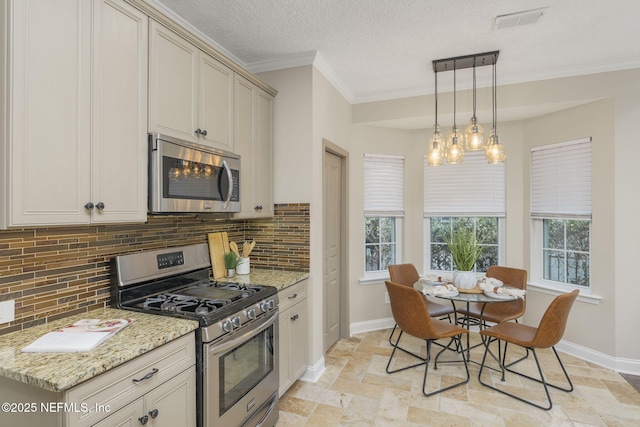 kitchen featuring tasteful backsplash, stone tile floors, visible vents, stainless steel appliances, and crown molding