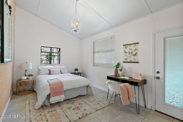 bedroom featuring vaulted ceiling, multiple windows, tile patterned flooring, and a chandelier