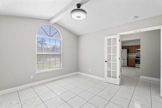 spare room featuring light tile patterned floors, baseboards, vaulted ceiling with beams, a textured ceiling, and french doors