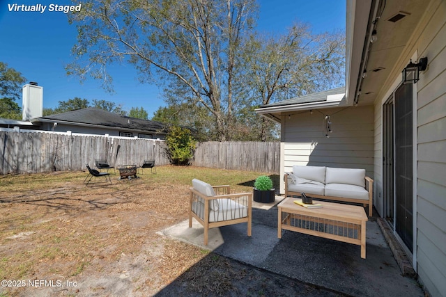 view of patio / terrace with outdoor lounge area and a fenced backyard