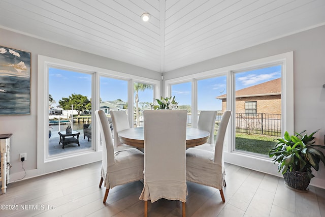 dining room with wood finished floors and baseboards