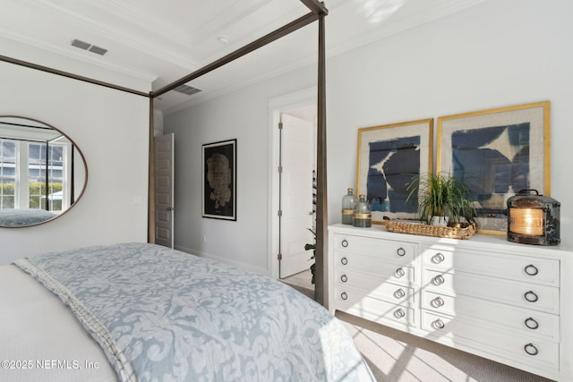 bedroom with ornamental molding and visible vents