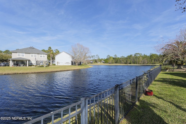 property view of water featuring fence