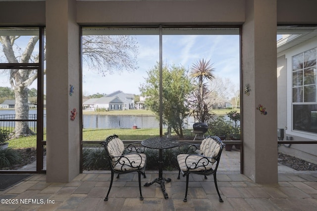 sunroom / solarium featuring a wealth of natural light