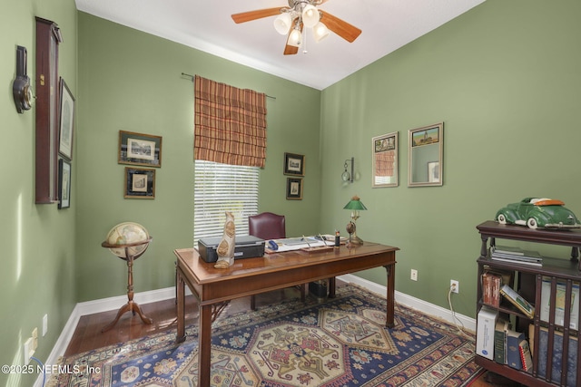 home office featuring wood finished floors, baseboards, and ceiling fan