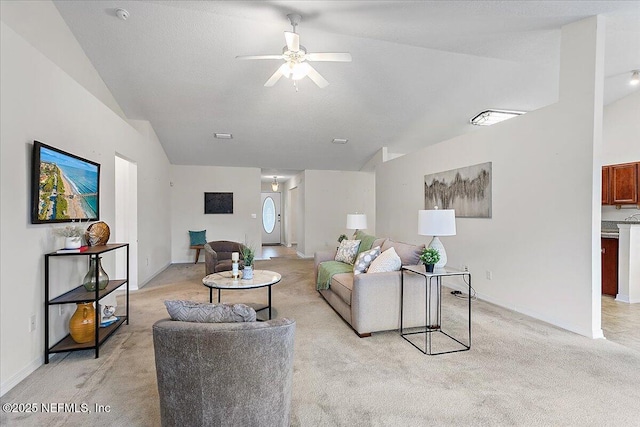 living area with lofted ceiling, light carpet, baseboards, and a ceiling fan