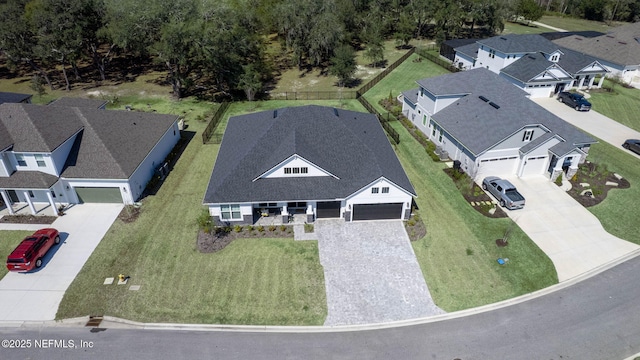 birds eye view of property with a residential view