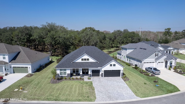 birds eye view of property with a residential view