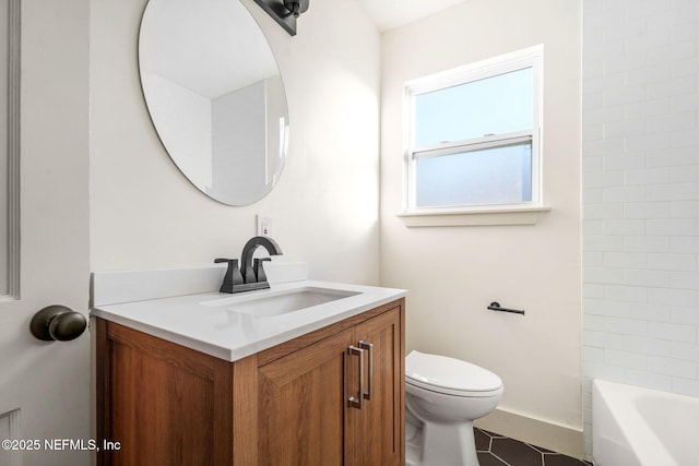 bathroom with vanity and toilet