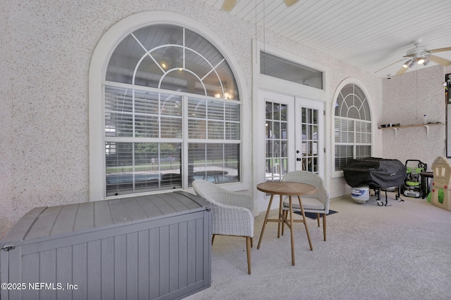 view of patio with ceiling fan, french doors, and a grill