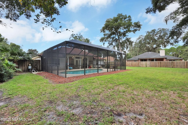 exterior space featuring a fenced in pool and a fenced backyard