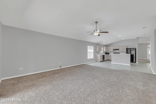 unfurnished living room featuring baseboards, a ceiling fan, light colored carpet, vaulted ceiling, and recessed lighting