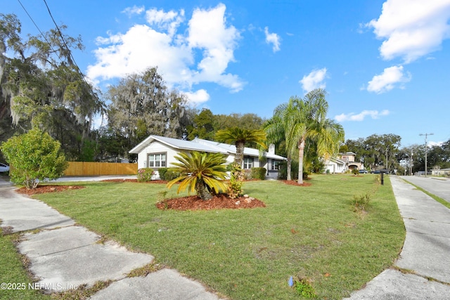 view of yard with fence